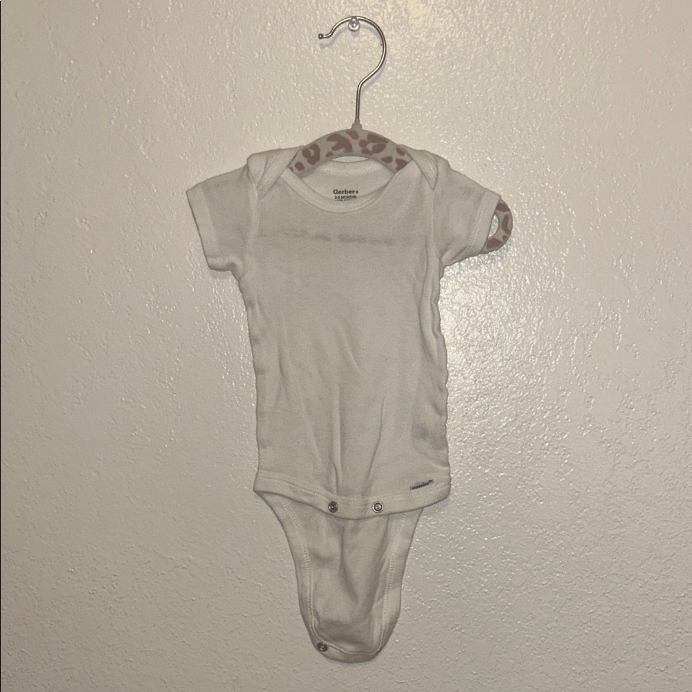 White Baby Onesie with Patterned Trim